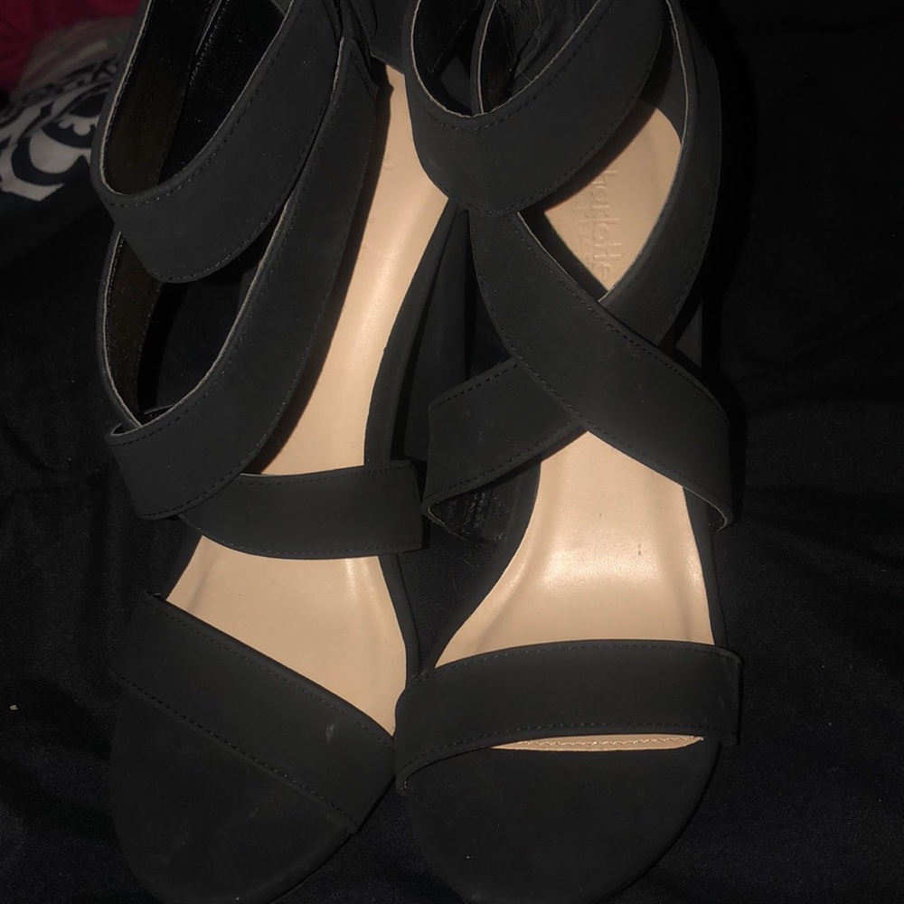 Brand new heels in the box. Didn’t fit me.